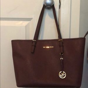 Michael Kors Jet Travel Tote in Merlot